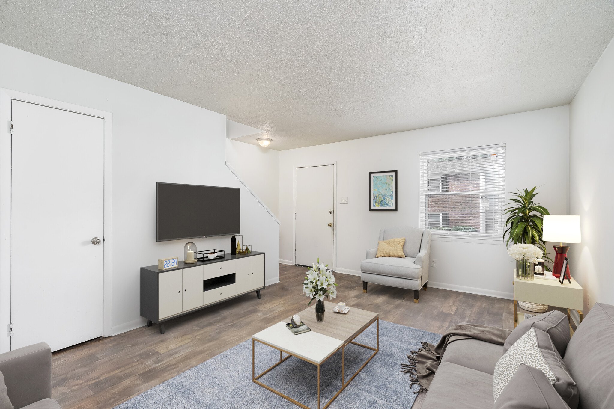 living room at Ashley Woods Apartments, located in the heart of Greensboro, North Carolina
